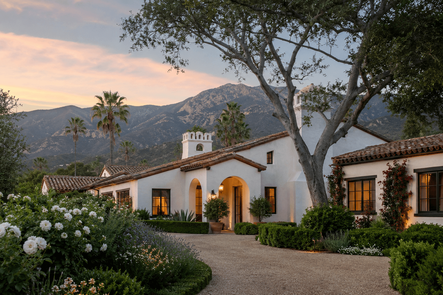 Spanish-style Montecito home exterior at sunset